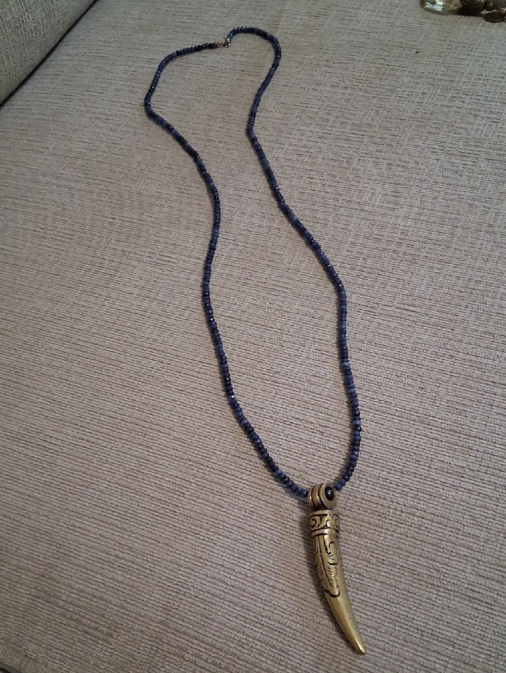 Beaded Navy Blue Necklace with Gold Tusk Pendant